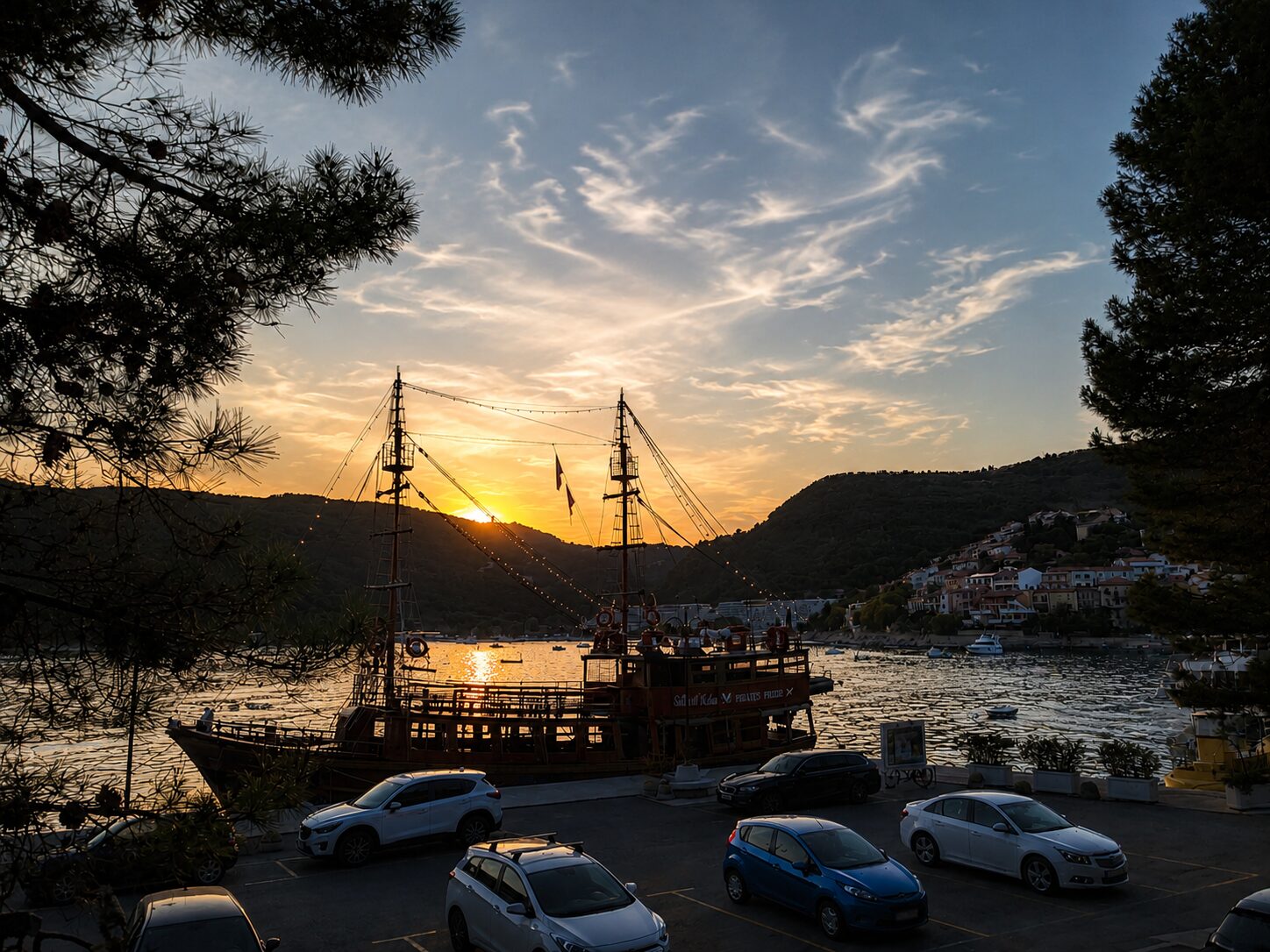 A final evening view in Rabac Rabac harbour and the surrounding hills in warm evening light