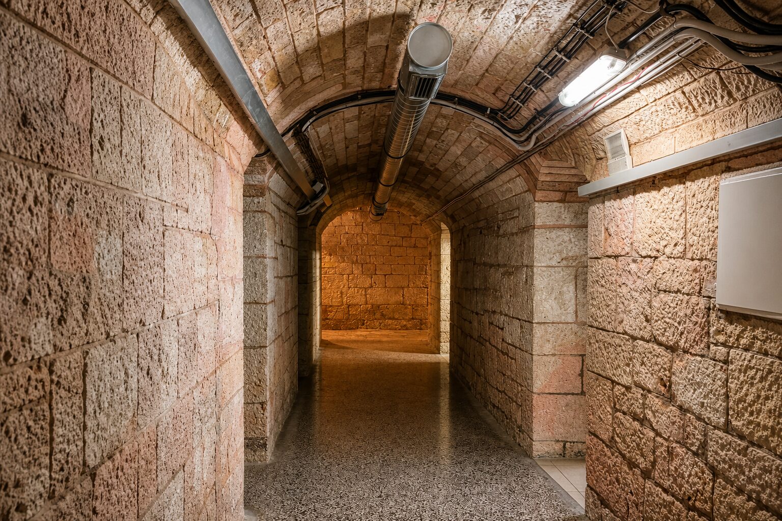 A fort passage inside Aquarium Pula Narrow stone passage inside historic Fort Verudela