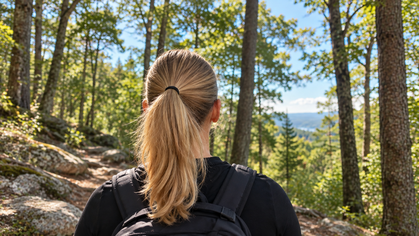 Hiker with a backpack on a wooded Učka path Hiker with a backpack on a wooded Učka path